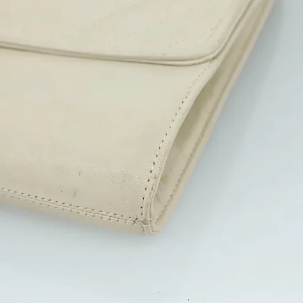 Saint Laurent Vintage Pre-owned Leather clutches Beige Dames