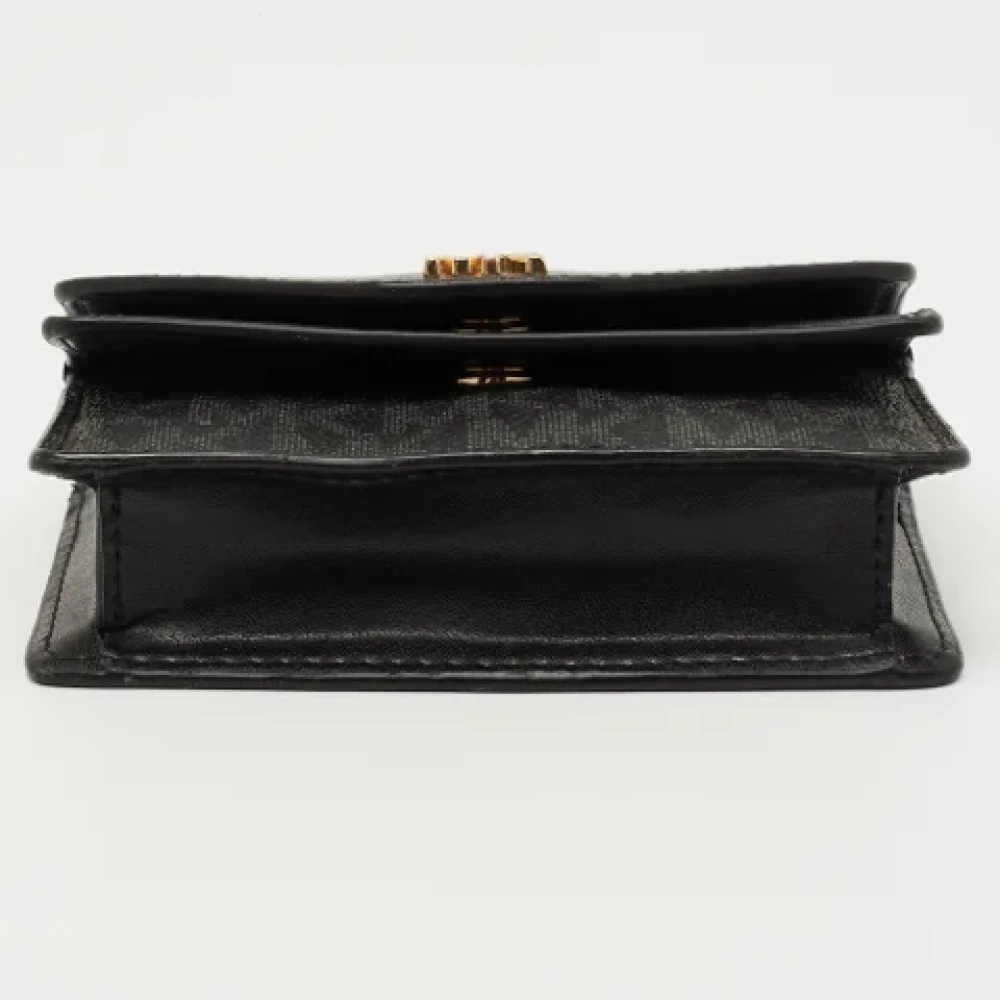 Michael Kors Pre-owned Coated canvas wallets Black Dames