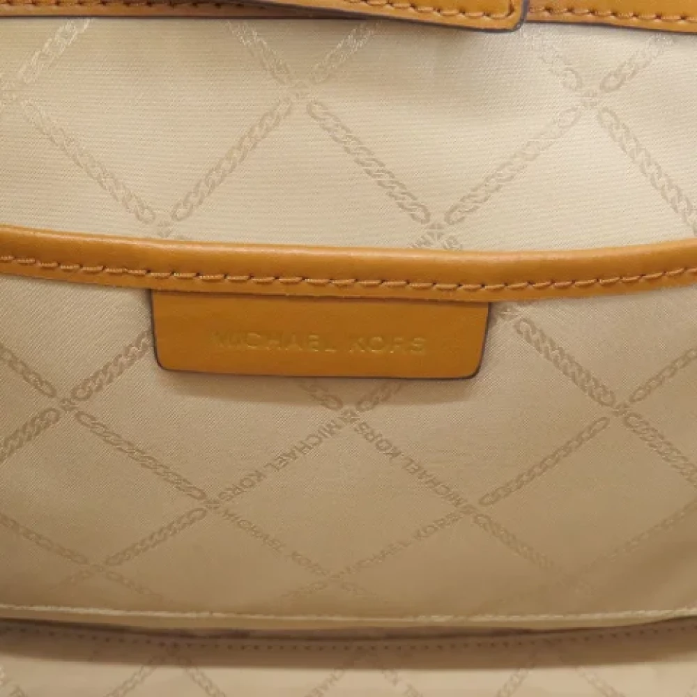 Michael Kors Pre-owned Plastic handbags Brown Dames