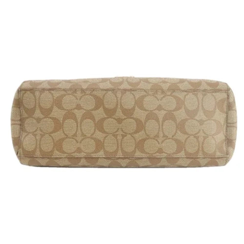 Coach Pre-owned Plastic handbags Brown Dames