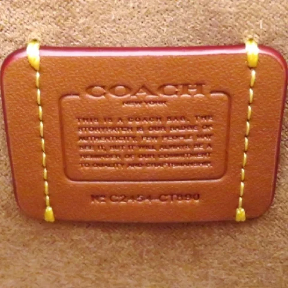 Coach Pre-owned Plastic handbags Beige Dames