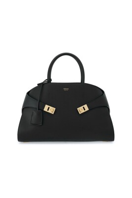 black-leather-handbag-with-gold-hardware