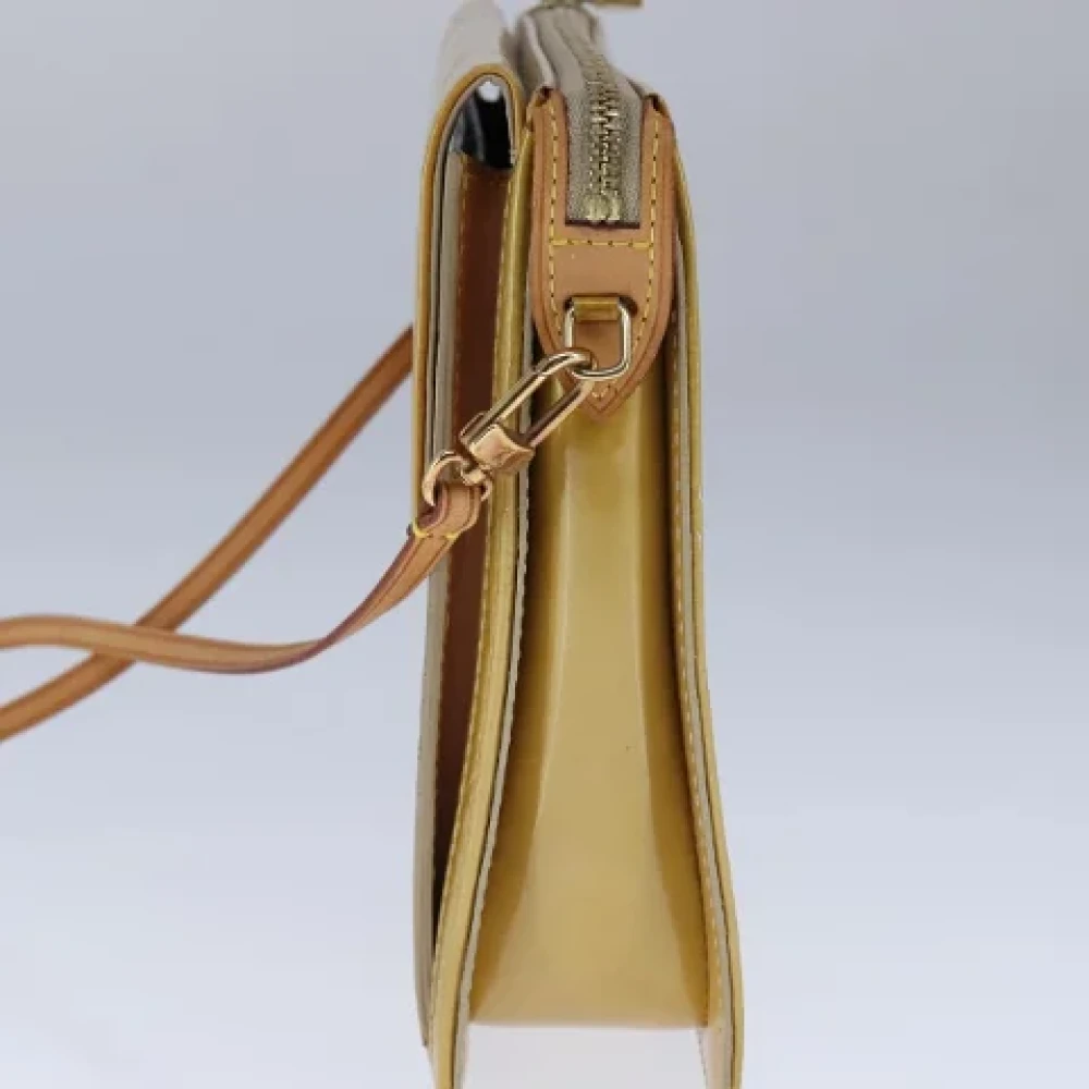Louis Vuitton Vintage Pre-owned Leather clutches Beige Dames