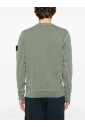 green-ribbed-sweater-with-badge