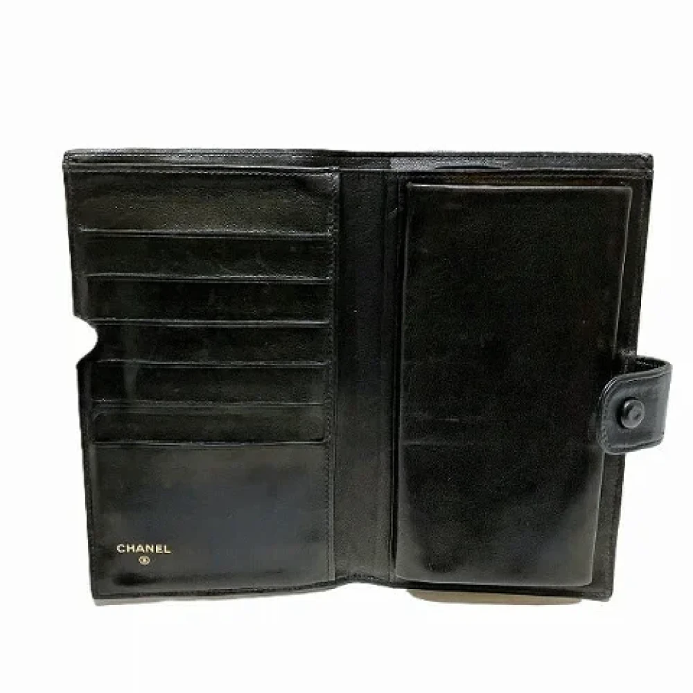 Chanel Vintage Pre-owned Leather wallets Black Dames