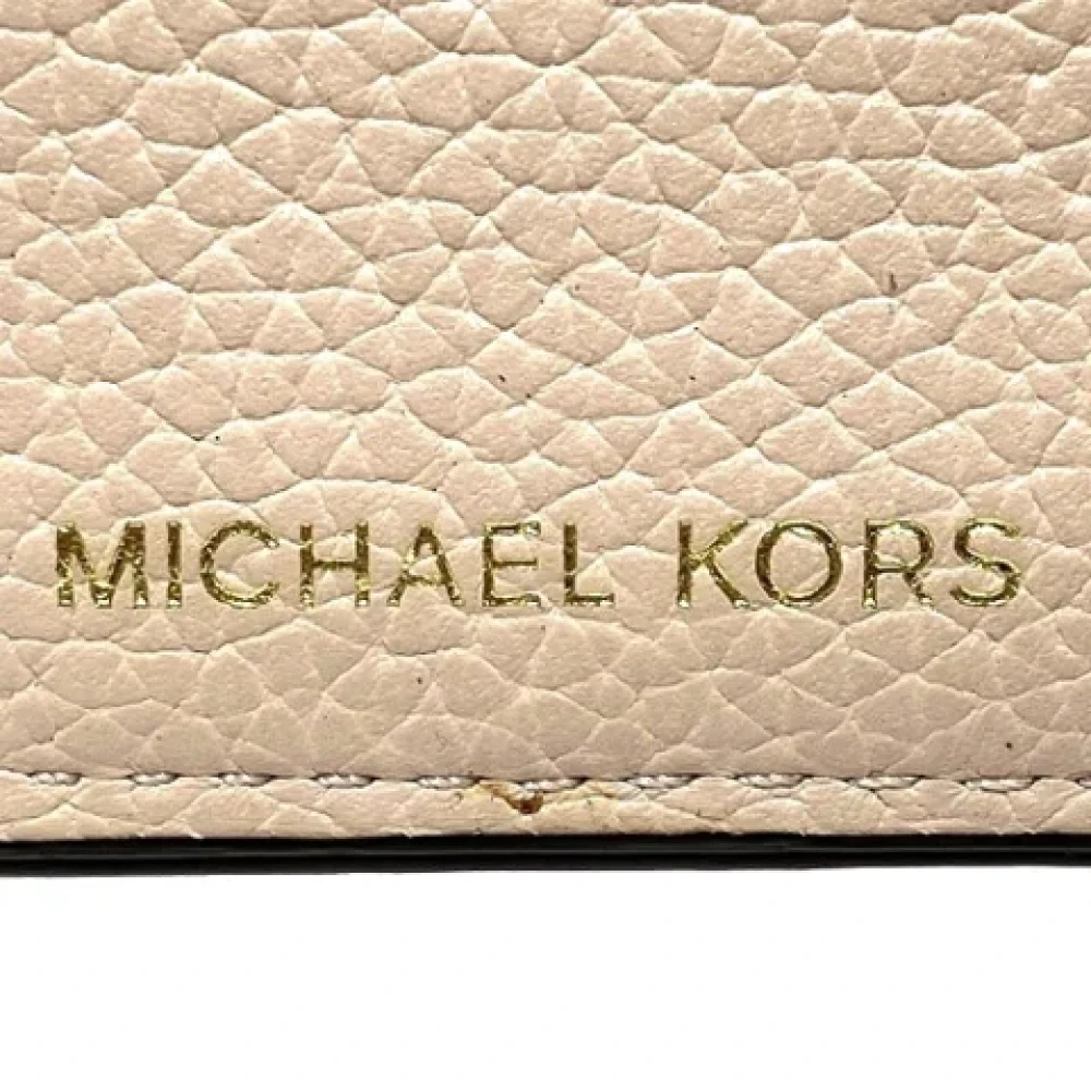 Michael Kors Pre-owned Canvas wallets Beige Dames