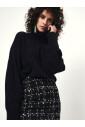 jupe-bouclee-tweed-noir-et-blanc