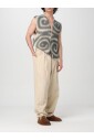 gilet-tricot-en-spirale-jaune-creme