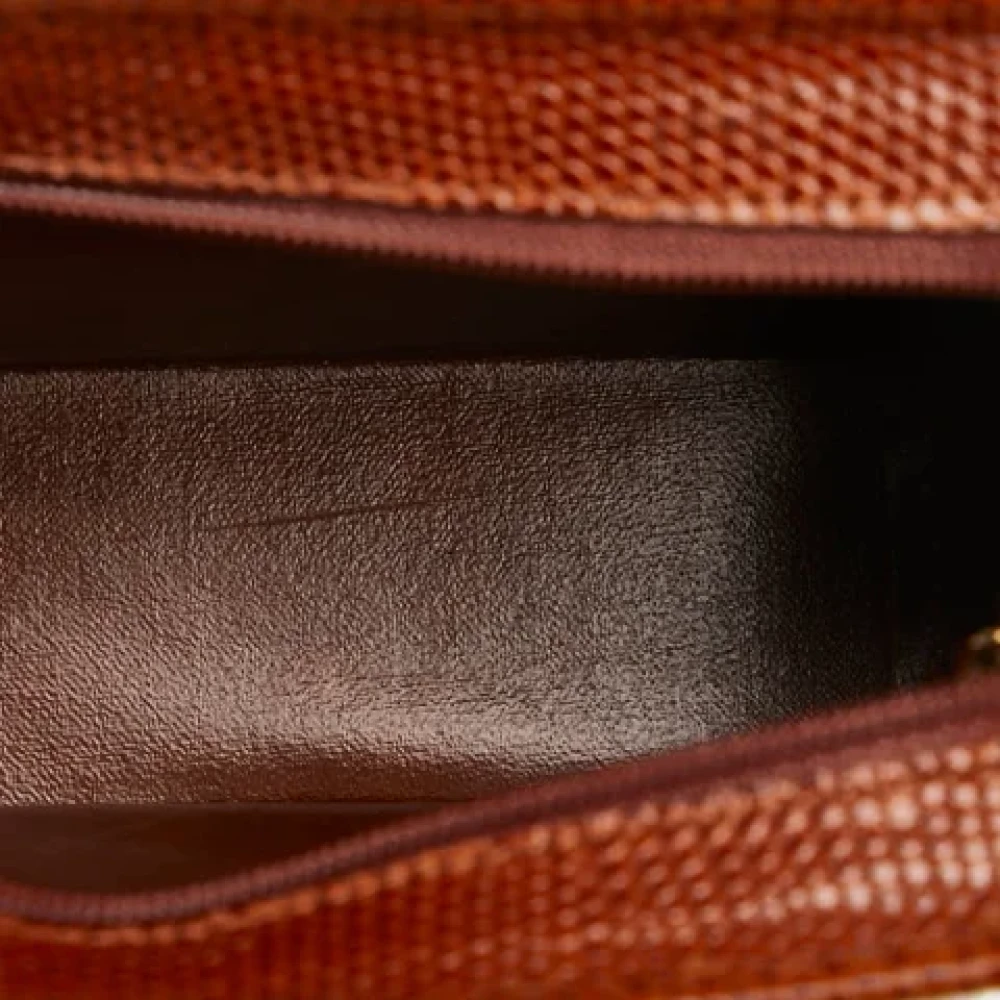 Salvatore Ferragamo Pre-owned Leather clutches Brown Dames