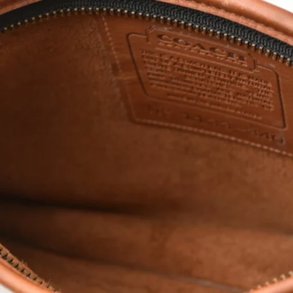 Coach Pre-owned Leather clutches Brown Dames
