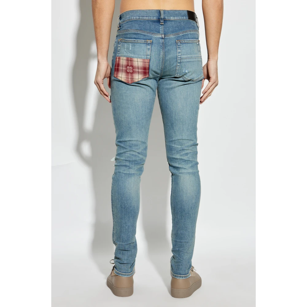 Amiri Jeans met patches Blue Heren