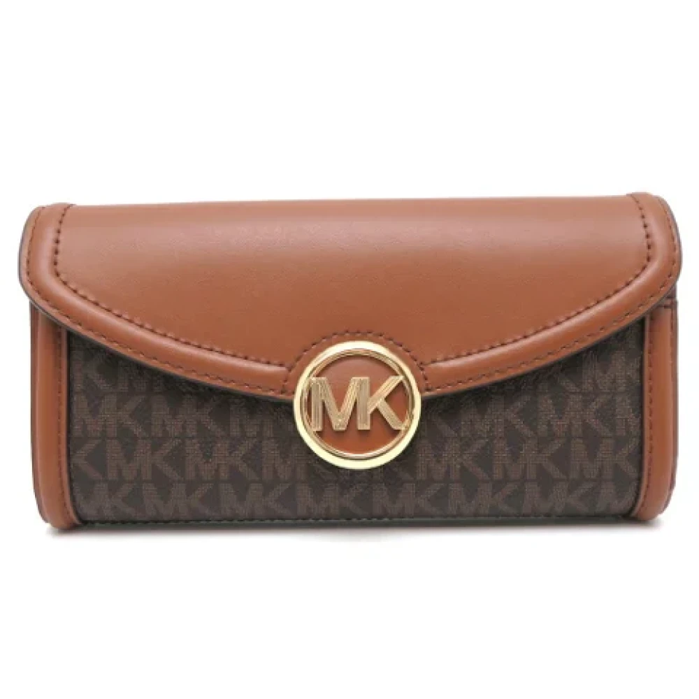 Michael Kors Pre-owned Canvas wallets Brown Dames