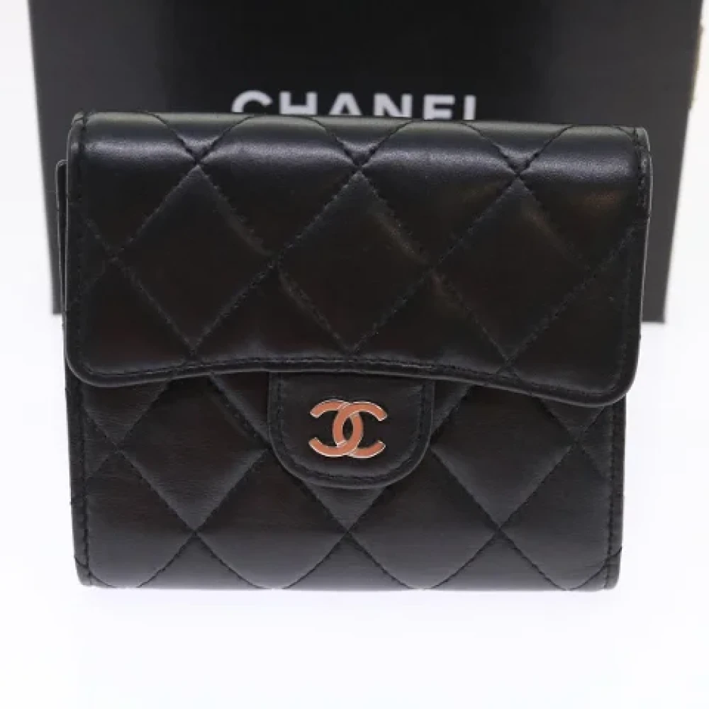 Gebrauchte Schwarze Leder Chanel Geldbörse UR8040