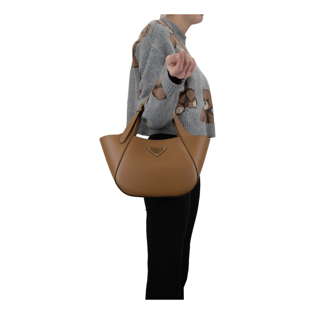 Prada Leren handtas met magnetische knoop Beige Dames