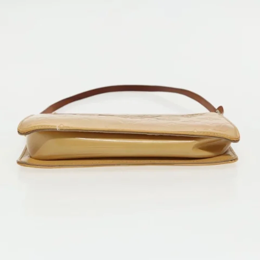 Louis Vuitton Vintage Pre-owned Leather pouches Beige Dames