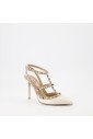 rockstud-pointed-toe-caged-pumps