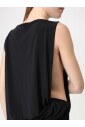 haut-en-jersey-noir-drape