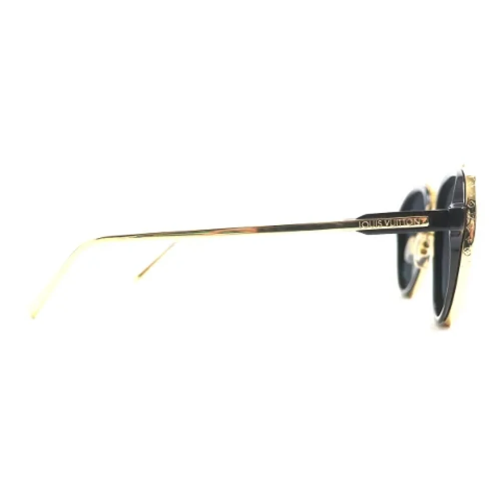 Louis Vuitton Vintage Pre-owned Metal sunglasses Yellow Dames