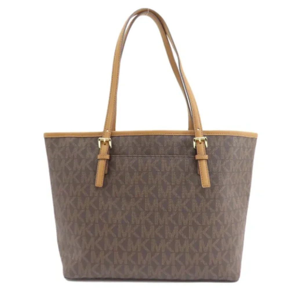 Michael Kors Pre-owned Plastic totes Brown Dames