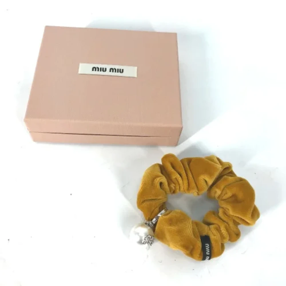 Miu Pre-owned Velvet hair-accessories Yellow Dames