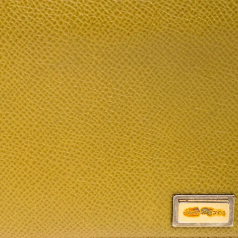 Dolce & Gabbana Pre-owned Leather wallets Yellow Dames