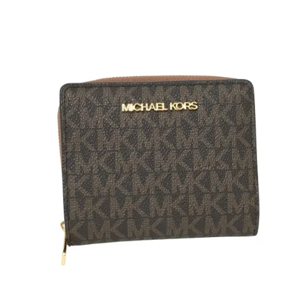 Michael Kors Pre-owned Canvas wallets Brown Dames