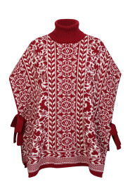 High-neck poncho with all-over print by La DoubleJ. Alterative and bold garment, made of merino wool to be comfortable and enveloping