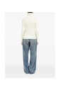 pull-a-col-roule-blanc-avec-details-decoupes