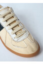 baskets-a-empiecements-effet-vieilli