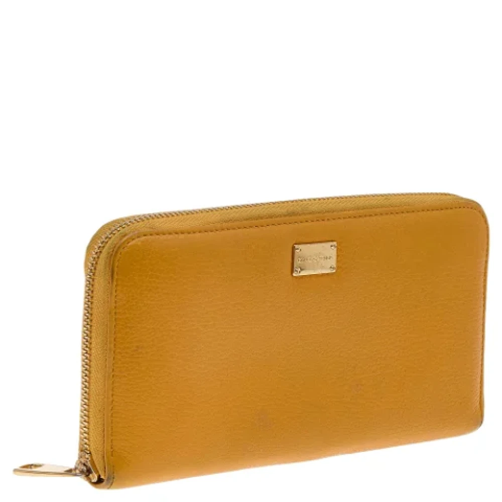 Dolce & Gabbana Pre-owned Leather wallets Yellow Dames