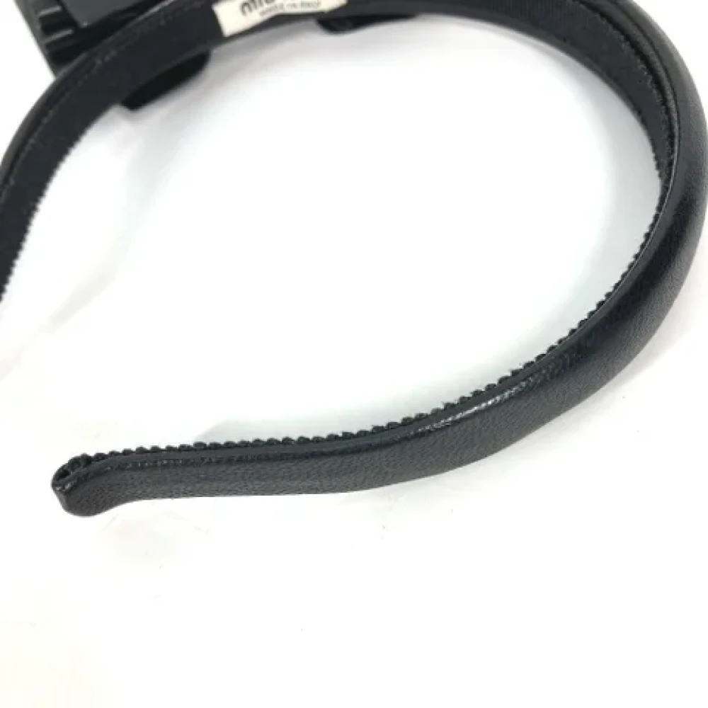 Miu Pre-owned Leather hair-accessories Black Dames