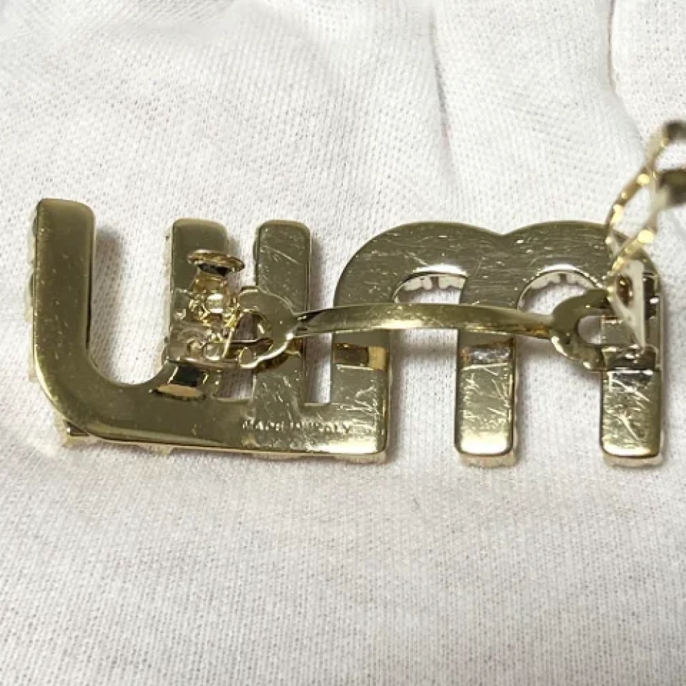 Miu Pre-owned Metal hair-accessories Yellow Dames