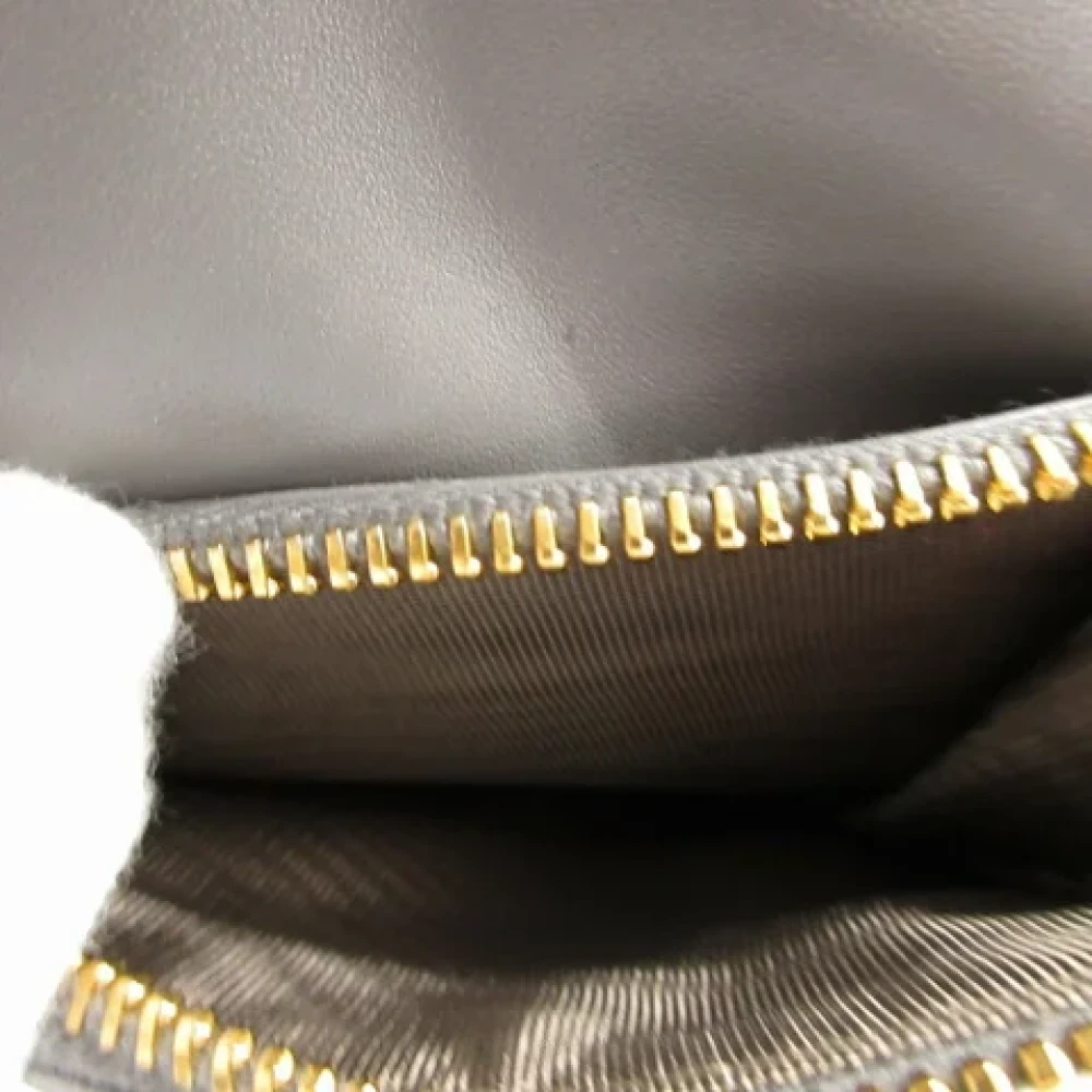 Miu Pre-owned Leather wallets Gray Dames
