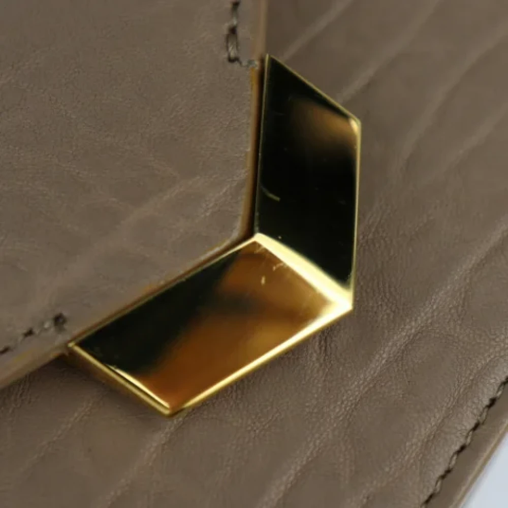 Jimmy Choo Pre-owned Leather clutches Beige Dames