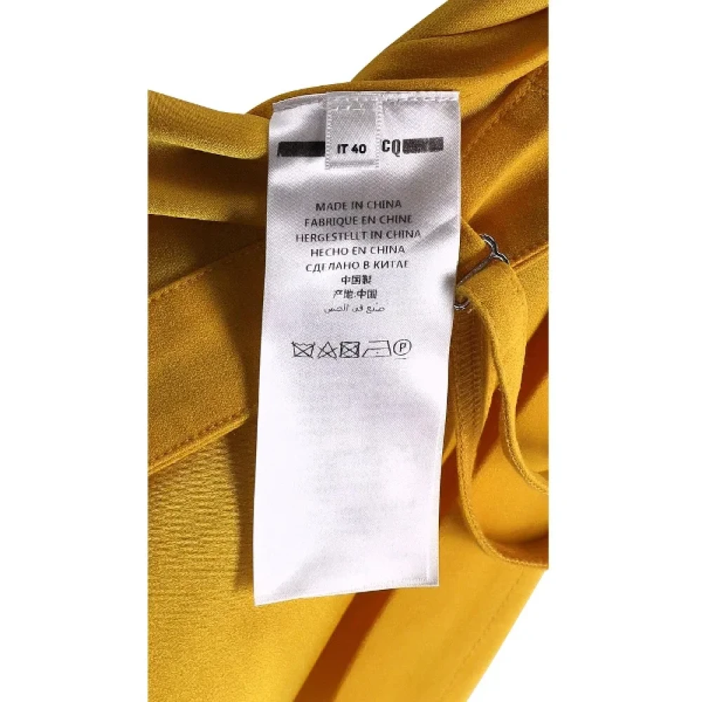 Alexander McQueen Pre-owned Fabric dresses Yellow Dames