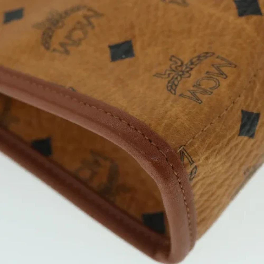 MCM Pre-owned Leather clutches Brown Dames