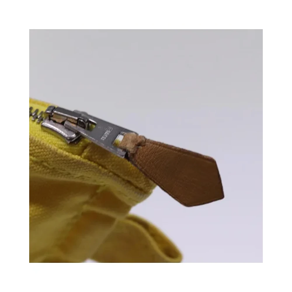 Hermès Vintage Pre-owned Canvas pouches Yellow Dames