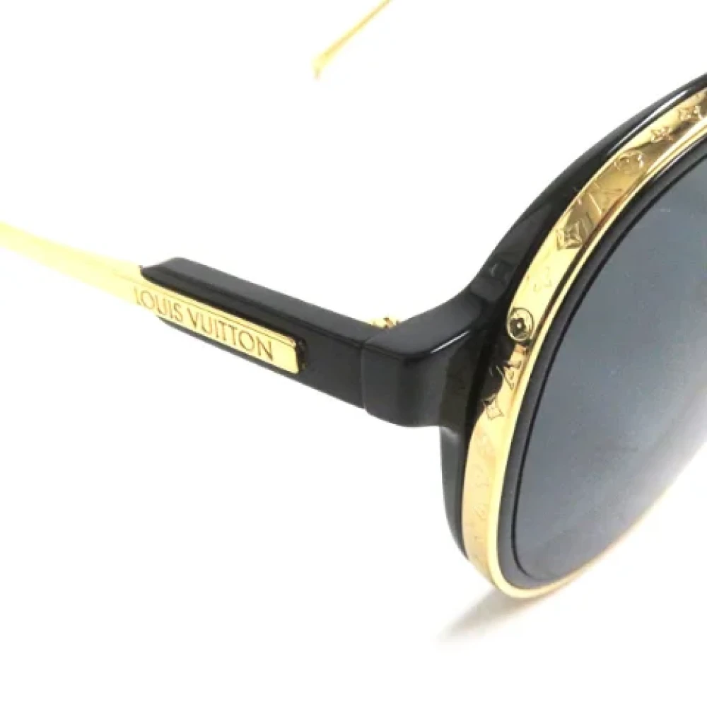 Louis Vuitton Vintage Pre-owned Metal sunglasses Yellow Dames