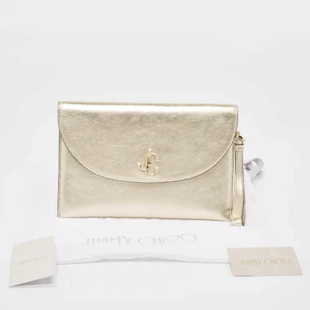 Jimmy Choo Pre-owned Fabric clutches Yellow Dames