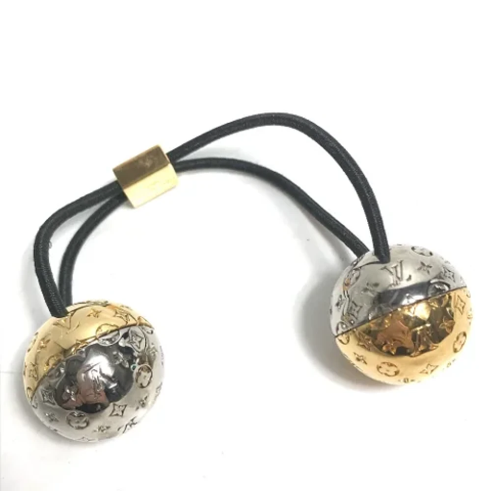 Louis Vuitton Vintage Pre-owned Metal hair-accessories Yellow Dames
