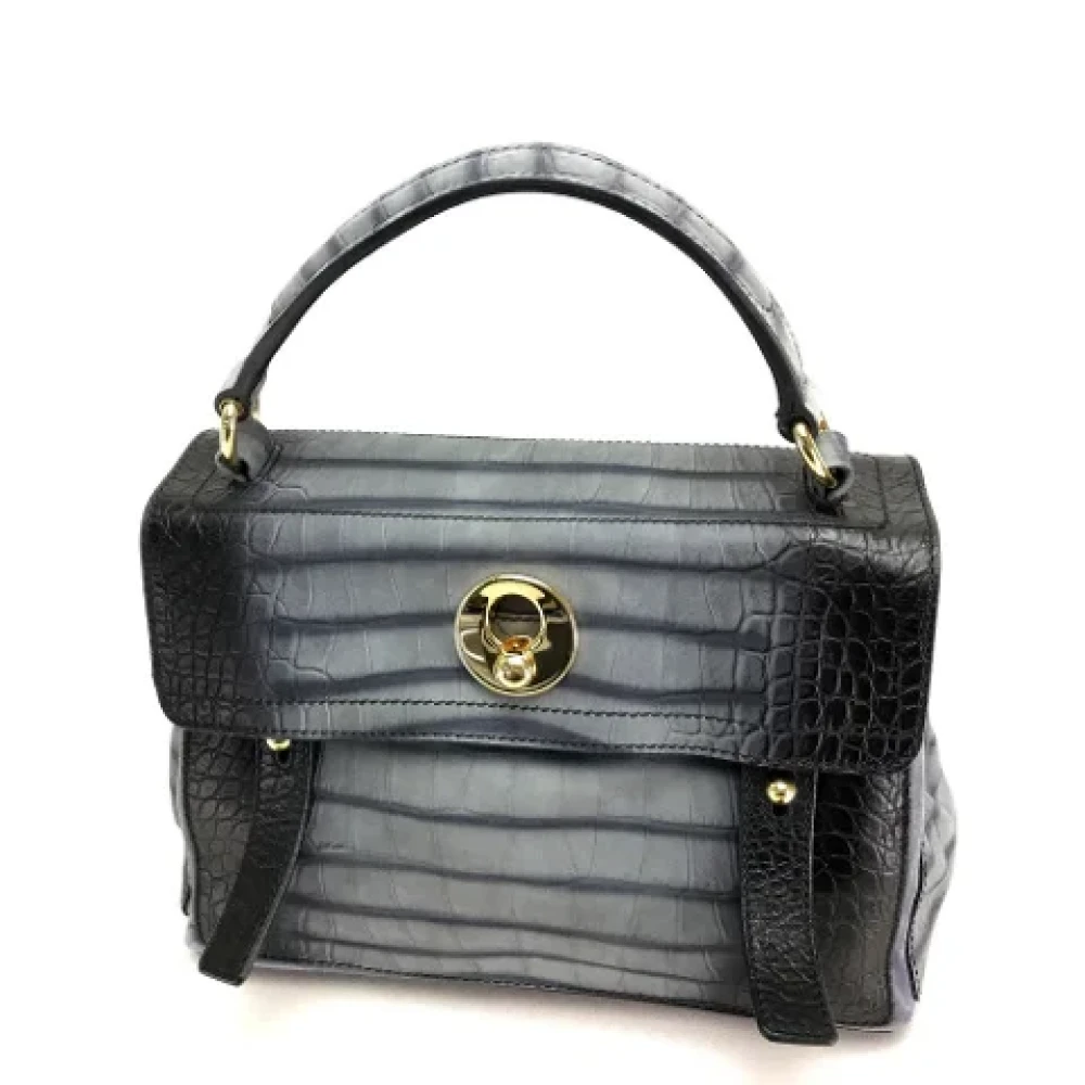Yves Saint Laurent Vintage Pre-owned Canvas handbags Black Dames