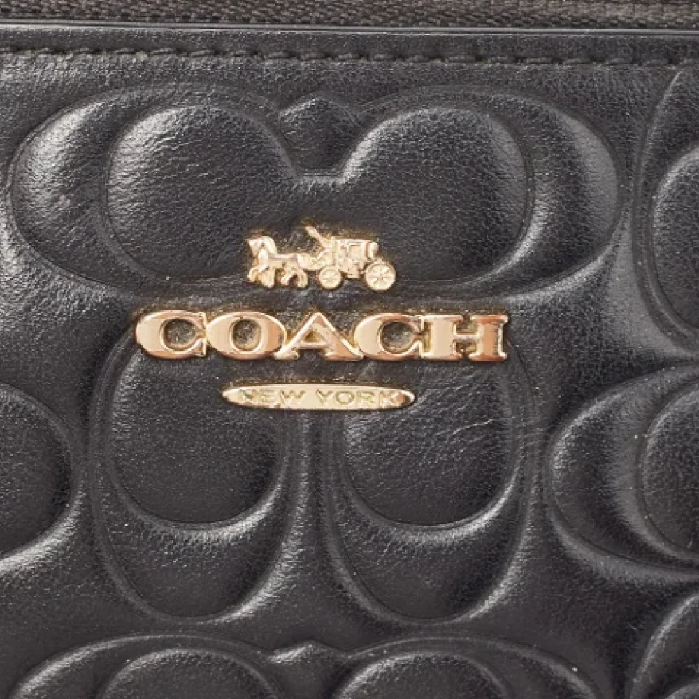 Coach Pre-owned Leather clutches Black Dames
