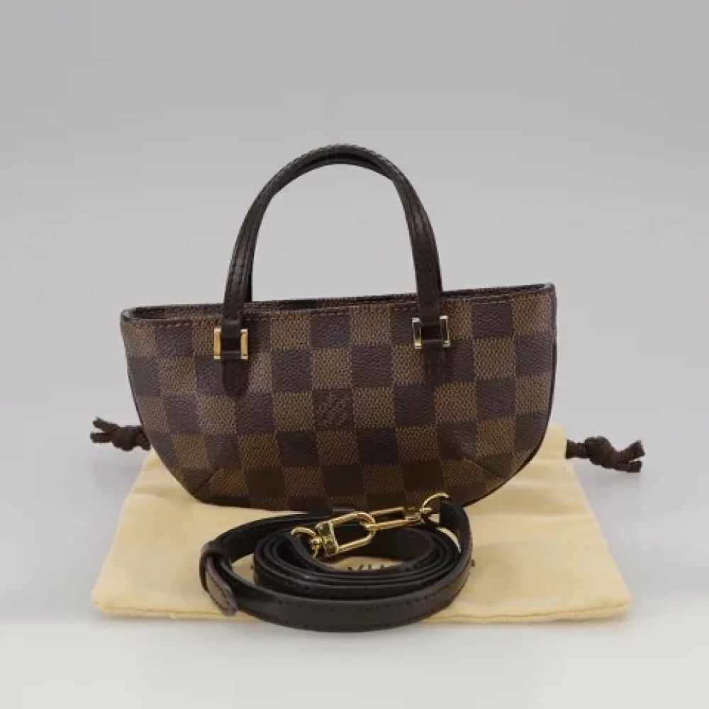 Louis Vuitton Vintage Pre-owned Canvas pouches Brown Dames