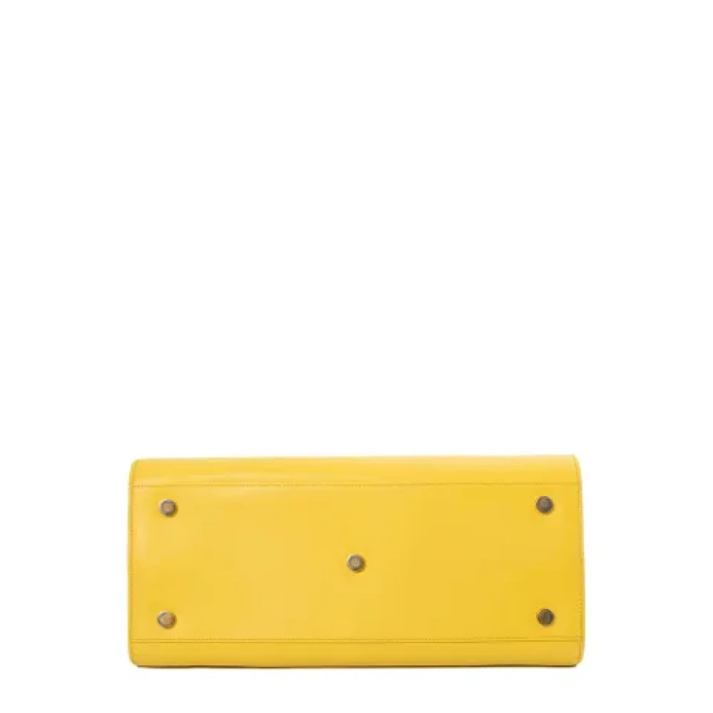 Yves Saint Laurent Vintage Pre-owned Leather handbags Yellow Dames