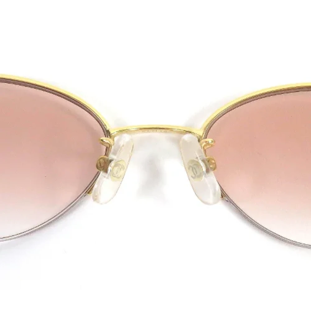 Chanel Vintage Pre-owned Metal sunglasses Yellow Dames