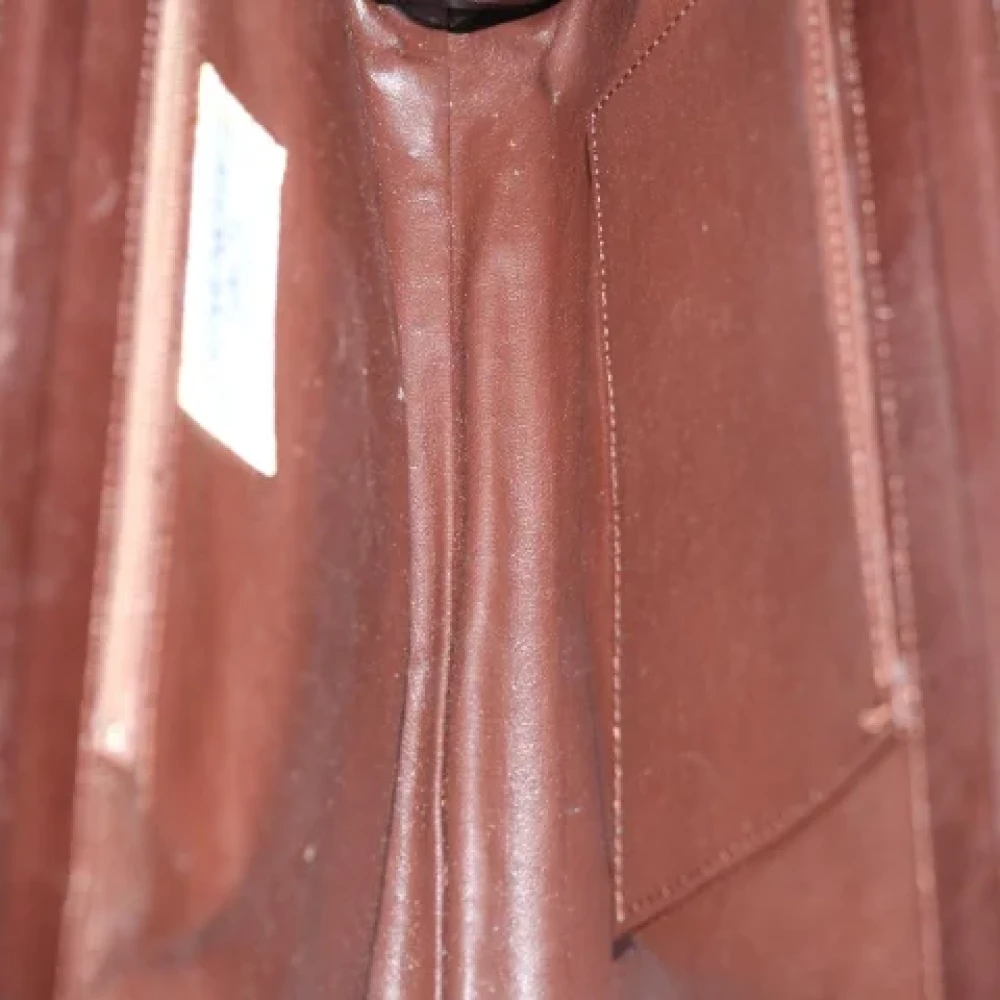 Givenchy Pre-owned Leather clutches Brown Dames