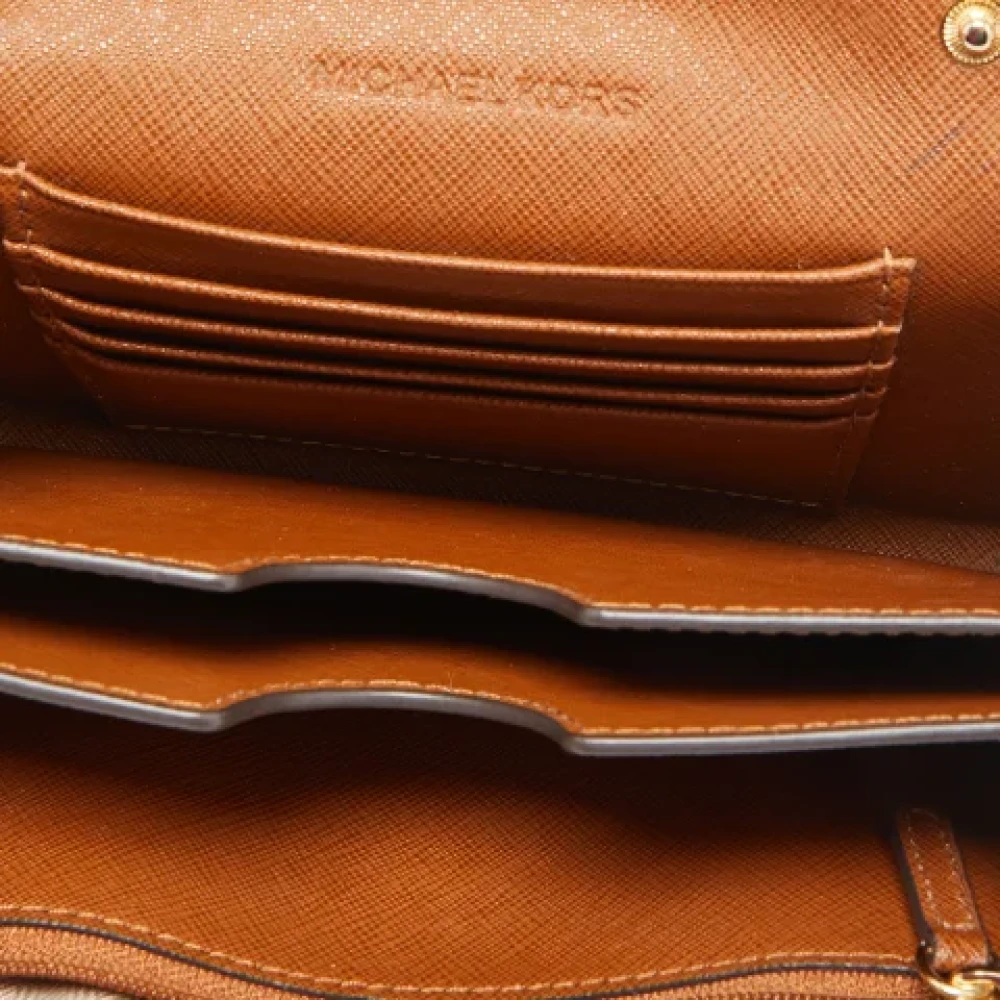Michael Kors Pre-owned Leather wallets Brown Dames