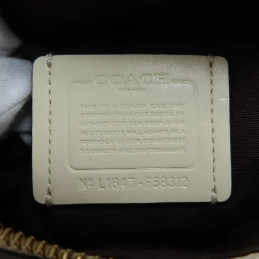 Coach Pre-owned Plastic handbags Beige Dames