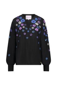Top a maniche lunghe con ricami floreali e scollo a V
