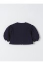 veste-bleue-a-manches-bouffantes